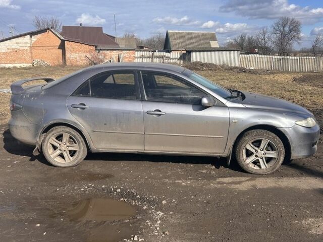 Серый Мазда 6, объемом двигателя 2.3 л и пробегом 300 тыс. км за 3500 $, фото 1 на Automoto.ua
