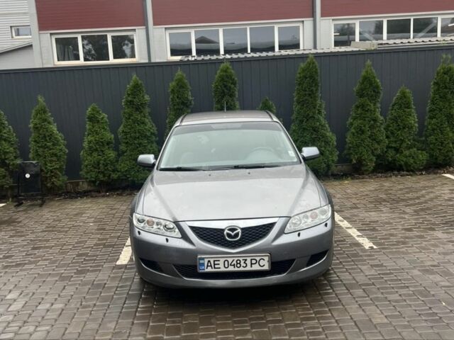 Серый Мазда 6, объемом двигателя 2 л и пробегом 306 тыс. км за 4700 $, фото 1 на Automoto.ua