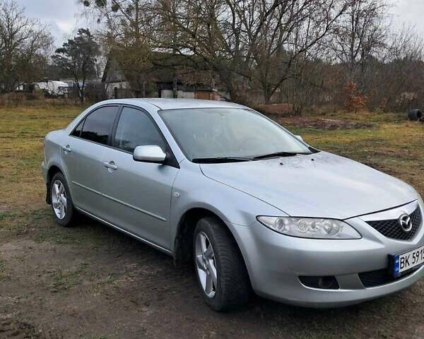 Серый Мазда 6, объемом двигателя 2 л и пробегом 288 тыс. км за 3500 $, фото 1 на Automoto.ua
