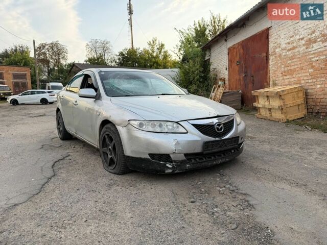 Серый Мазда 6, объемом двигателя 2 л и пробегом 300 тыс. км за 900 $, фото 1 на Automoto.ua