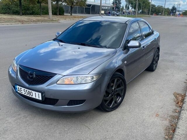 Серый Мазда 6, объемом двигателя 1.8 л и пробегом 260 тыс. км за 5000 $, фото 1 на Automoto.ua