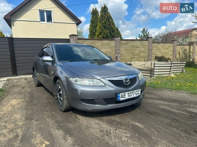 Серый Мазда 6, объемом двигателя 1.8 л и пробегом 366 тыс. км за 3800 $, фото 1 на Automoto.ua