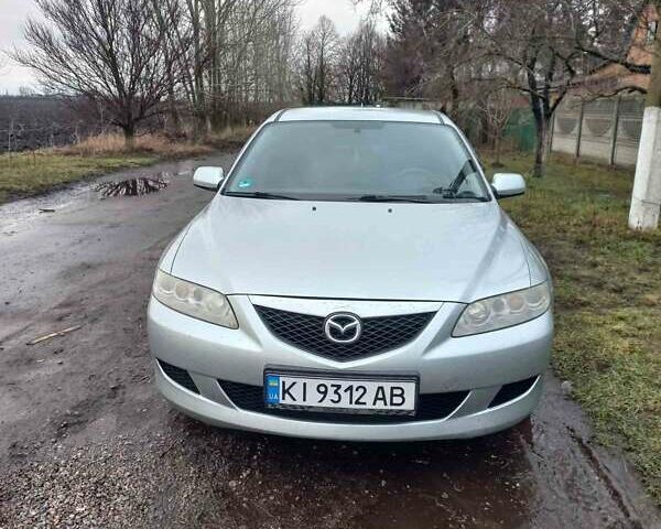 Сірий Мазда 6, об'ємом двигуна 2 л та пробігом 445 тис. км за 4500 $, фото 1 на Automoto.ua