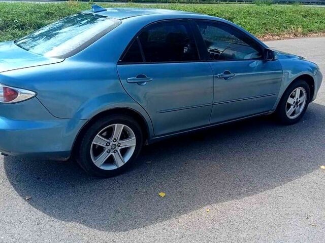 Серый Мазда 6, объемом двигателя 2.3 л и пробегом 300 тыс. км за 3500 $, фото 1 на Automoto.ua