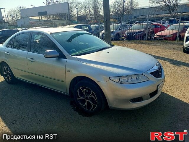 Серый Мазда 6, объемом двигателя 1.8 л и пробегом 333 тыс. км за 2750 $, фото 1 на Automoto.ua