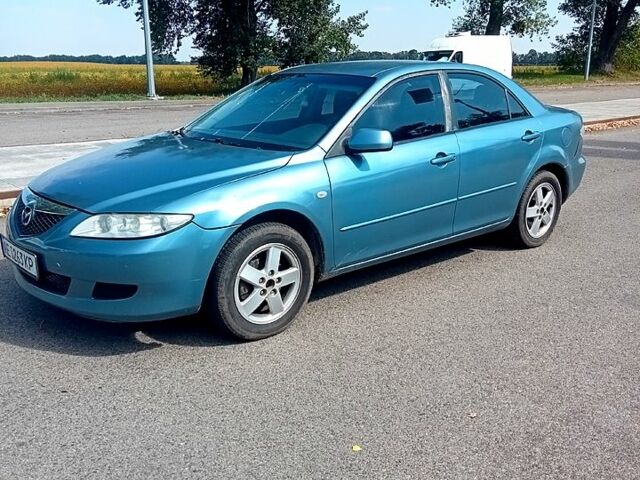 Серый Мазда 6, объемом двигателя 2.3 л и пробегом 280 тыс. км за 2600 $, фото 1 на Automoto.ua