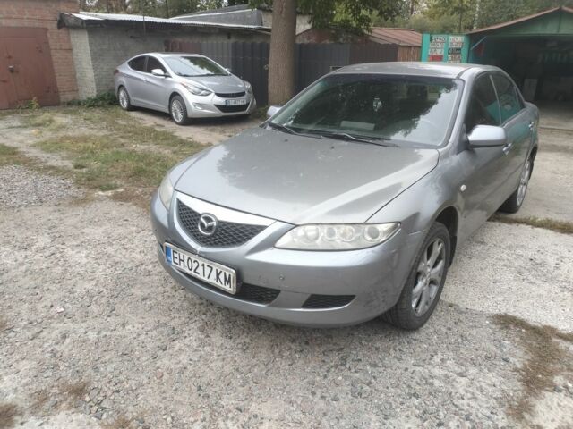 Серый Мазда 6, объемом двигателя 2 л и пробегом 317 тыс. км за 2200 $, фото 1 на Automoto.ua