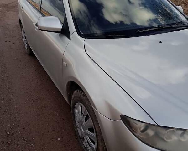 Серый Мазда 6, объемом двигателя 2 л и пробегом 250 тыс. км за 3600 $, фото 1 на Automoto.ua