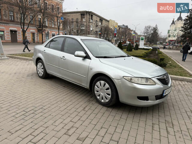 Серый Мазда 6, объемом двигателя 1.8 л и пробегом 290 тыс. км за 3350 $, фото 1 на Automoto.ua