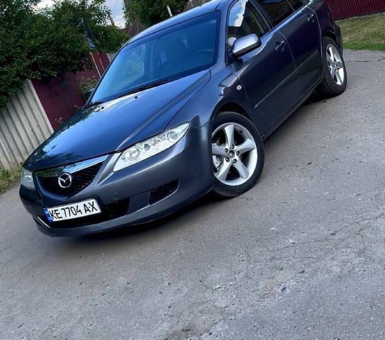 Серый Мазда 6, объемом двигателя 2 л и пробегом 211 тыс. км за 4500 $, фото 1 на Automoto.ua