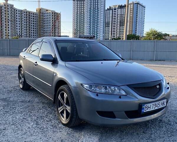 Серый Мазда 6, объемом двигателя 2 л и пробегом 310 тыс. км за 4500 $, фото 1 на Automoto.ua