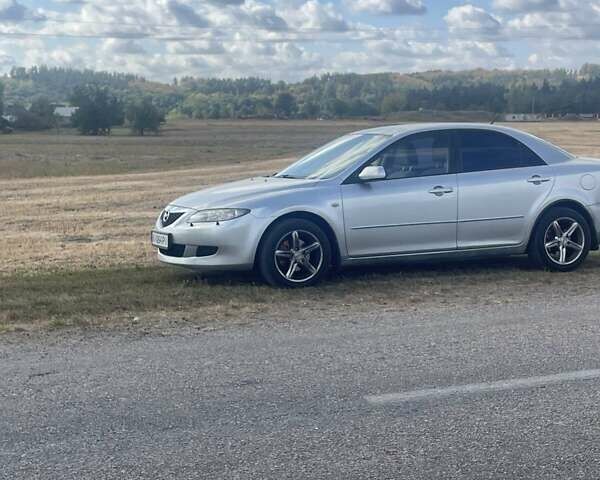 Серый Мазда 6, объемом двигателя 2 л и пробегом 327 тыс. км за 4000 $, фото 1 на Automoto.ua