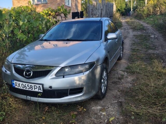 Серый Мазда 6, объемом двигателя 2 л и пробегом 400 тыс. км за 2123 $, фото 1 на Automoto.ua