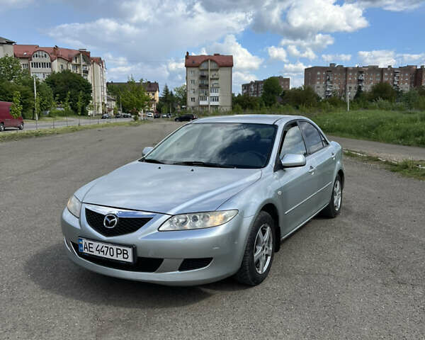 Серый Мазда 6, объемом двигателя 2 л и пробегом 298 тыс. км за 2800 $, фото 1 на Automoto.ua