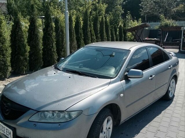 Серый Мазда 6, объемом двигателя 2 л и пробегом 355 тыс. км за 2400 $, фото 1 на Automoto.ua