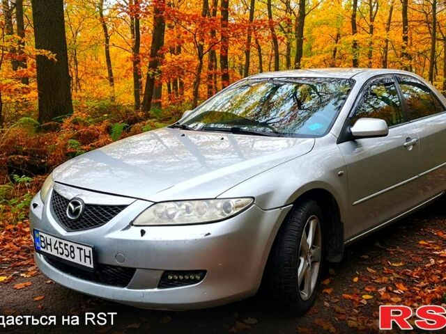 Сірий Мазда 6, об'ємом двигуна 2.3 л та пробігом 321 тис. км за 2850 $, фото 1 на Automoto.ua
