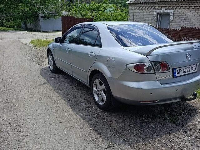 Сірий Мазда 6, об'ємом двигуна 2 л та пробігом 411 тис. км за 3500 $, фото 1 на Automoto.ua