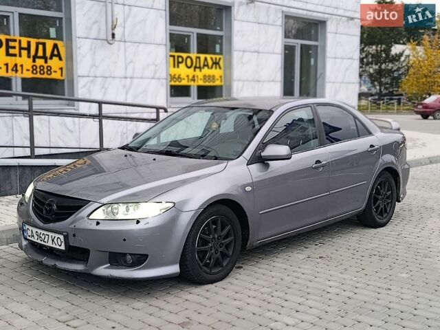Серый Мазда 6, объемом двигателя 2 л и пробегом 300 тыс. км за 2999 $, фото 1 на Automoto.ua
