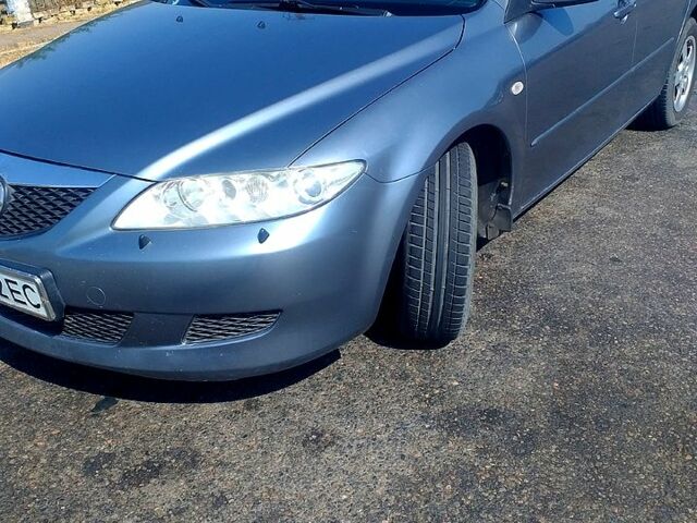 Серый Мазда 6, объемом двигателя 1.8 л и пробегом 320 тыс. км за 3600 $, фото 1 на Automoto.ua