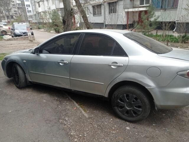 Серый Мазда 6, объемом двигателя 2 л и пробегом 356 тыс. км за 1800 $, фото 1 на Automoto.ua