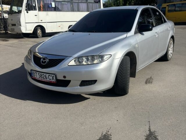 Серый Мазда 6, объемом двигателя 2 л и пробегом 255 тыс. км за 4000 $, фото 1 на Automoto.ua