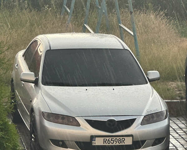 Серый Мазда 6, объемом двигателя 2 л и пробегом 320 тыс. км за 4000 $, фото 1 на Automoto.ua