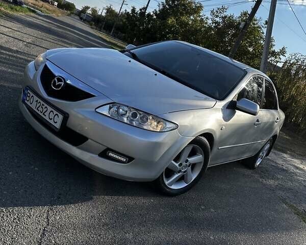 Серый Мазда 6, объемом двигателя 1.8 л и пробегом 232 тыс. км за 3850 $, фото 1 на Automoto.ua