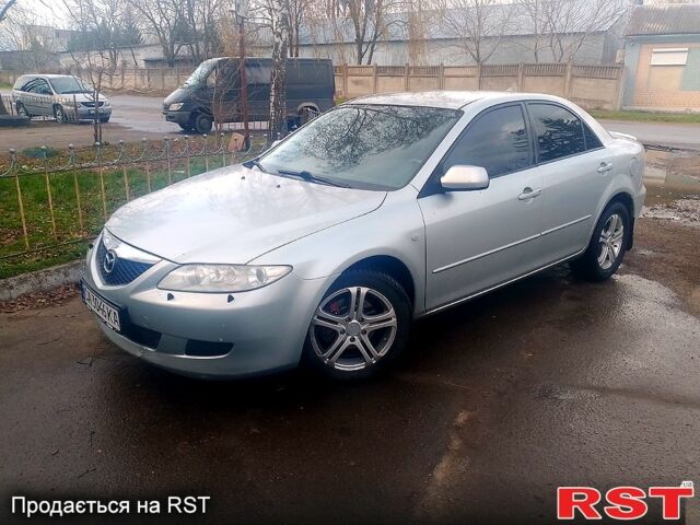 Серый Мазда 6, объемом двигателя 2 л и пробегом 298 тыс. км за 2300 $, фото 1 на Automoto.ua