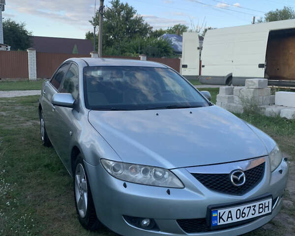 Серый Мазда 6, объемом двигателя 2 л и пробегом 412 тыс. км за 3700 $, фото 1 на Automoto.ua