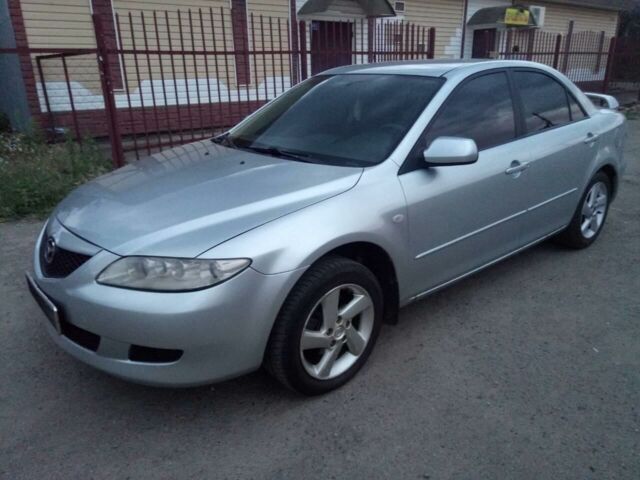 Серый Мазда 6, объемом двигателя 2 л и пробегом 235 тыс. км за 5100 $, фото 1 на Automoto.ua