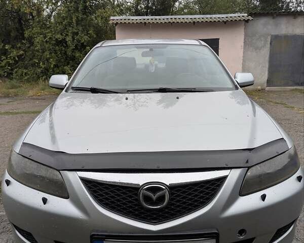 Серый Мазда 6, объемом двигателя 2 л и пробегом 250 тыс. км за 3500 $, фото 1 на Automoto.ua
