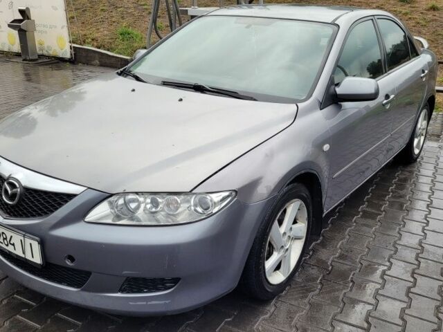 Серый Мазда 6, объемом двигателя 2 л и пробегом 238 тыс. км за 5500 $, фото 1 на Automoto.ua
