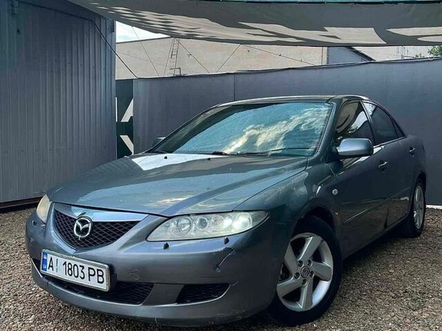 Серый Мазда 6, объемом двигателя 2 л и пробегом 271 тыс. км за 2600 $, фото 1 на Automoto.ua