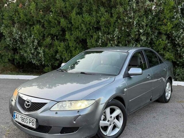 Серый Мазда 6, объемом двигателя 2 л и пробегом 272 тыс. км за 2400 $, фото 1 на Automoto.ua