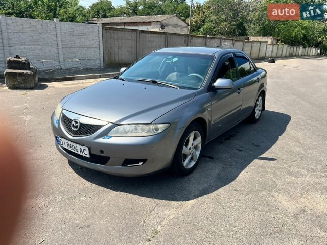 Серый Мазда 6, объемом двигателя 2 л и пробегом 226 тыс. км за 2150 $, фото 1 на Automoto.ua