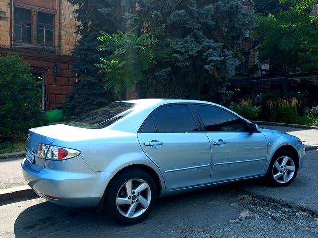 Сірий Мазда 6, об'ємом двигуна 2 л та пробігом 318 тис. км за 4950 $, фото 1 на Automoto.ua