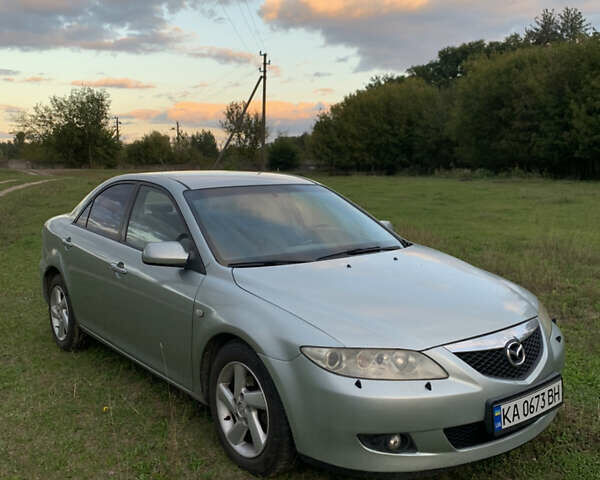 Серый Мазда 6, объемом двигателя 2 л и пробегом 412 тыс. км за 4000 $, фото 1 на Automoto.ua