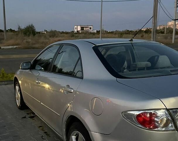 Сірий Мазда 6, об'ємом двигуна 2 л та пробігом 517 тис. км за 4300 $, фото 1 на Automoto.ua