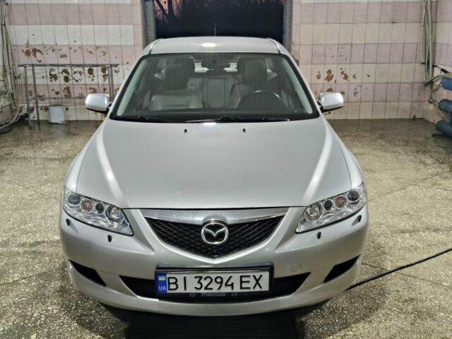 Серый Мазда 6, объемом двигателя 2 л и пробегом 256 тыс. км за 4200 $, фото 1 на Automoto.ua