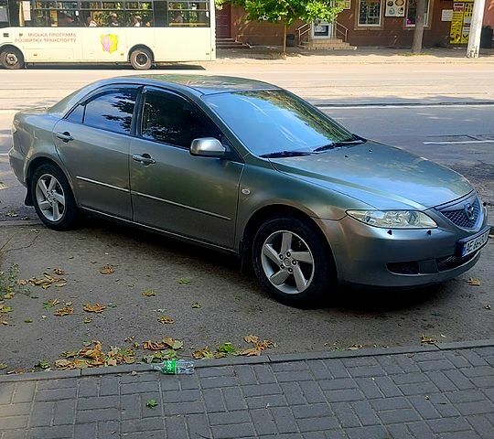 Серый Мазда 6, объемом двигателя 2 л и пробегом 350 тыс. км за 4000 $, фото 1 на Automoto.ua