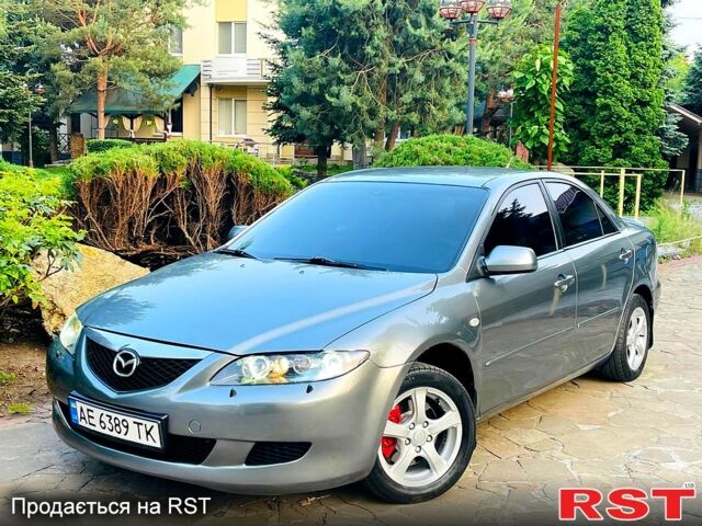 Серый Мазда 6, объемом двигателя 2 л и пробегом 230 тыс. км за 4750 $, фото 1 на Automoto.ua
