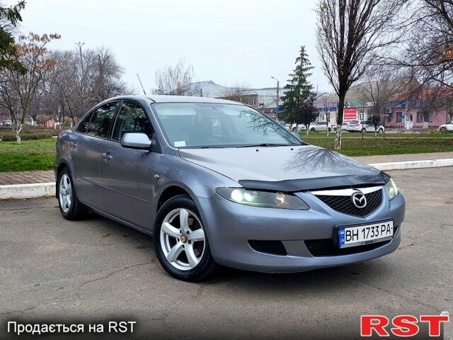 Серый Мазда 6, объемом двигателя 2 л и пробегом 325 тыс. км за 3700 $, фото 1 на Automoto.ua