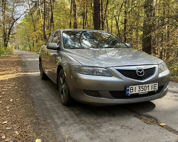 Серый Мазда 6, объемом двигателя 2 л и пробегом 227 тыс. км за 4500 $, фото 1 на Automoto.ua