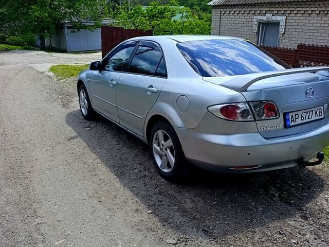 Серый Мазда 6, объемом двигателя 2 л и пробегом 411 тыс. км за 3500 $, фото 1 на Automoto.ua