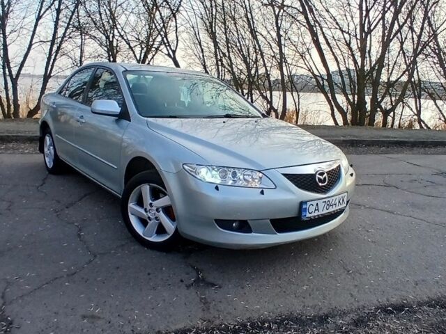 Серый Мазда 6, объемом двигателя 2 л и пробегом 320 тыс. км за 4200 $, фото 1 на Automoto.ua