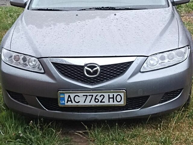 Серый Мазда 6, объемом двигателя 2 л и пробегом 356 тыс. км за 2448 $, фото 1 на Automoto.ua