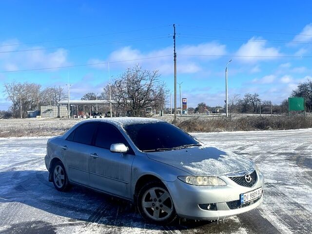 Серый Мазда 6, объемом двигателя 1.8 л и пробегом 252 тыс. км за 5000 $, фото 1 на Automoto.ua