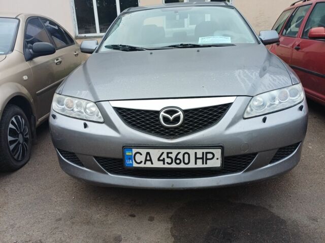 Серый Мазда 6, объемом двигателя 2 л и пробегом 260 тыс. км за 3300 $, фото 1 на Automoto.ua