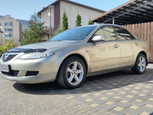 Серый Мазда 6, объемом двигателя 2 л и пробегом 285 тыс. км за 5200 $, фото 1 на Automoto.ua