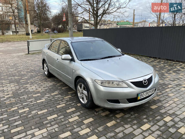 Серый Мазда 6, объемом двигателя 2 л и пробегом 244 тыс. км за 3800 $, фото 1 на Automoto.ua